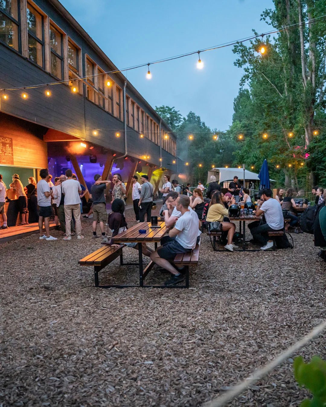 Wellenwerk beer garden in the evening with string lights