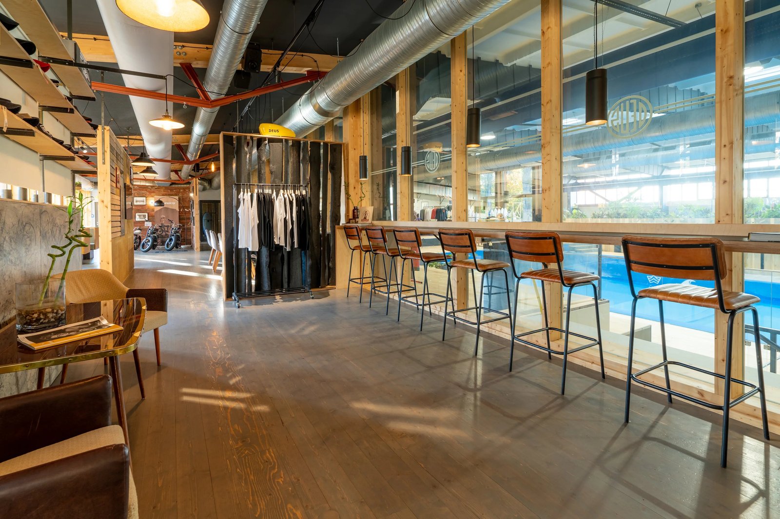Surf hall at Wellenwerk with bar and view of the wave